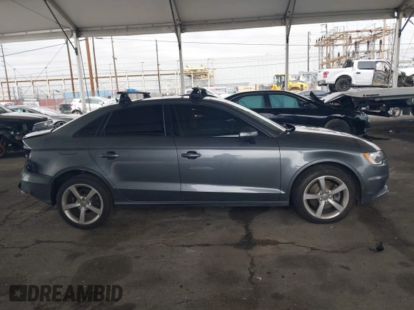 2015 Audi A3 Premium z VIN WAUACGFF3F1073735, wystawiony jako IAAI lot #42184594 z przebiegiem 104 906 mil mil oraz . Historia ofert i sprzedaży dostępna na DreamBid. Obrazek 13.