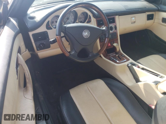 2003 Mercedes-Benz SLK 320 with VIN WDBKK65F43F284008, listed as a Copart auction lot 61010215 with 81,179 mi miles and Clean title. Bid and sale history available at DreamBid. Image 8.