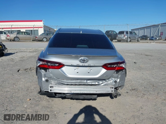 2021 Toyota Camry SE Nightshade with VIN 4T1G11AK1MU529646, listed as a IAAI auction lot 41650962 with 57,879 mi miles. Bid and sale history available at carsss.com. Image 17.