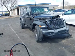 2023 Jeep Wrangler Sport S z VIN 1C4HJXDN5PW634233, wystawiony jako IAAI lot #41926302 z przebiegiem 14 422 mil mil oraz . Historia ofert i sprzedaży dostępna na DreamBid. Obrazek 1.