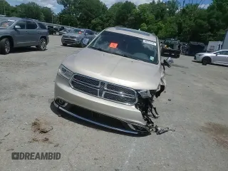 2015 Dodge Durango Citadel with VIN 1C4SDHET0FC873740, listed as a Copart auction lot 56067255 with 131,362 mi miles and Salvage title. Bid and sale history available at DreamBid. Image 15.