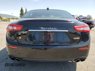 2017 Maserati Ghibli S с VIN ZAM57RSA1H1212595, выставлен на аукционе Copart как лот 52111405 с пробегом 55 158 миль миль и Списание • Salvage title. История ставок и продаж доступна на DreamBid. Изображение 6.