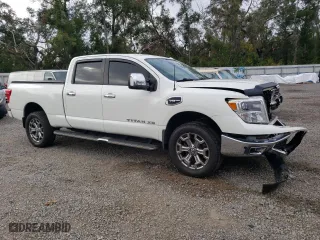 2018 Nissan Titan XD SV with VIN 1N6AA1F40JN518998, listed as a Copart auction lot 79595064 with 71,556 mi miles and Non Repairable. Bid and sale history available at carsss.com. Image 4.