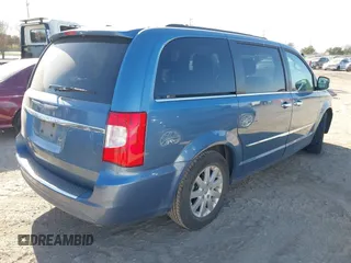 2012 Chrysler Town & Country Touring L with VIN 2C4RC1CG9CR163477, listed as a IAAI auction lot 41214896 with 112,763 mi miles and . Bid and sale history available at DreamBid. Image 4.