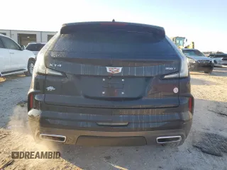 2024 Cadillac XT4 FWD Sport with VIN 1GYFZER47RF101186, listed as a Copart auction lot 79128454 with 10,499 mi miles and Salvage title. Bid and sale history available at DreamBid. Image 6.
