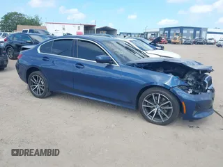 2021 BMW 3 Series 330i with VIN 3MW5R1J05M8B71660, listed as a IAAI auction lot 41923054 with 37,636 mi miles. Bid and sale history available at carsss.com. Image 1.