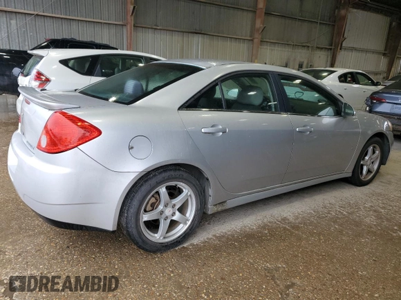 2009 Pontiac G6 GT 1SB z VIN 1G2ZK57K694233980, wystawiony jako Copart lot #54146815 z przebiegiem 96 973 mil mil oraz Szkoda całkowita • Salvage title. Historia ofert i sprzedaży dostępna na DreamBid. Obrazek 3.