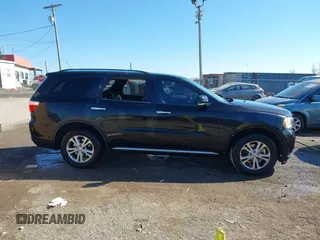 2013 Dodge Durango Crew with VIN 1C4SDHDT3DC553939, listed as a IAAI auction lot 41404491 with 148,505 mi miles and . Bid and sale history available at carsss.com. Image 13.