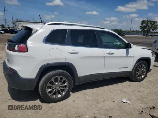 2020 Jeep Cherokee Lux with VIN 1C4PJLLX4LD517207, listed as a Copart auction lot 59304434 with 56,952 mi miles and Non repairable. Bid and sale history available at DreamBid. Image 3.
