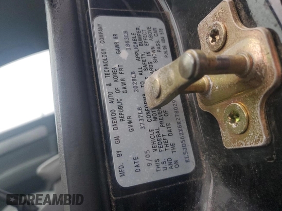 2006 Suzuki Forenza z VIN KL5JD56ZX6K278029, wystawiony jako Copart lot #82026904 z przebiegiem 117 700 mil mil oraz Szkoda całkowita • Salvage title. Historia ofert i sprzedaży dostępna na DreamBid. Obrazek 12.