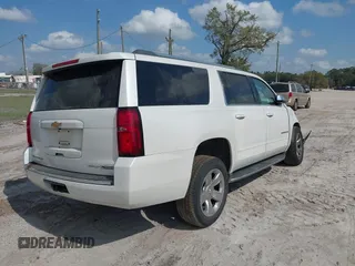 2017 Chevrolet Suburban Premier with VIN 1GNSKJKC0HR288648, listed as a IAAI auction lot 41579677 with Not Provided miles and . Bid and sale history available at DreamBid. Image 4.