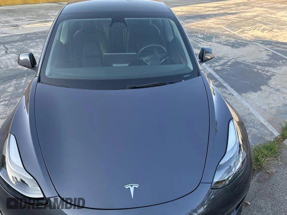 2023 Tesla Model 3 with VIN 5YJ3E1EA1PF607137, listed as a Copart auction lot 62613375 with 27,271 mi miles and Clean title. Bid and sale history available at DreamBid. Image 7.