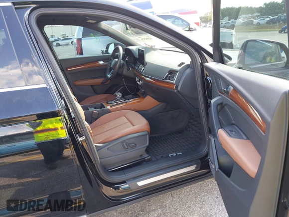 2023 Audi Q5 Premium Plus z VIN WA1BBAFY9P2085449, wystawiony jako IAAI lot #41508525 z przebiegiem 11 225 mil mil oraz . Historia ofert i sprzedaży dostępna na DreamBid. Obrazek 5.