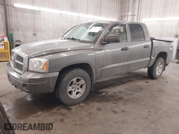 2007 Dodge Dakota SLT z VIN 1D7HW48J17S138642, wystawiony jako IAAI lot #41419794 z przebiegiem 79 350 mil mil oraz . Historia ofert i sprzedaży dostępna na DreamBid. Obrazek 2.