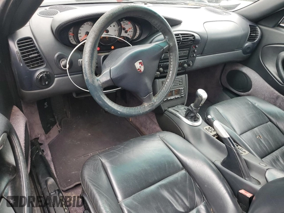 2001 Porsche 911 z VIN WP0CA29951S653243, wystawiony jako Copart lot #55835075 z przebiegiem 142 918 mil mil oraz Szkoda całkowita • Salvage title. Historia ofert i sprzedaży dostępna na DreamBid. Obrazek 8.