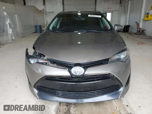 2019 Toyota Corolla L with VIN 2T1BURHE5KC146503, listed as a Copart auction lot 50903175 with 130,292 mi miles and Salvage Title. Bid and sale history available at DreamBid. Image 5.