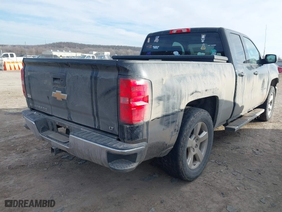 2014 Chevrolet Silverado 1500 LT with VIN 1GCRCREH1EZ399344, listed as a IAAI auction lot 41364007 with 217,707 mi miles. Bid and sale history available at carsss.com. Image 4.