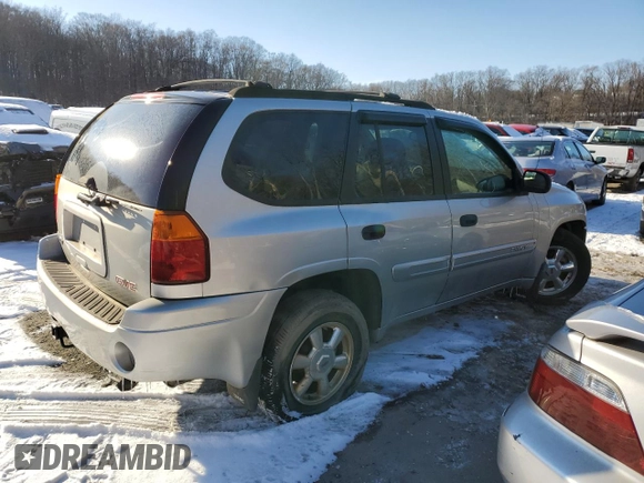 2005 GMC Envoy SLE with VIN 1GKDT13S952144044, listed as a Copart auction lot 88269485 with 0 mi miles and Salvage Title. Bid and sale history available at carsss.com. Image 3.