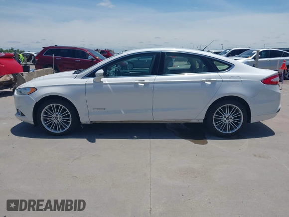 2014 Ford Fusion SE Hybrid with VIN 3FA6P0LUXER233658, listed as a IAAI auction lot 42311588 with 106,282 mi miles and . Bid and sale history available at DreamBid. Image 14.