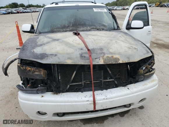 2004 GMC Yukon Denali with VIN 1GKEK63U44J222403, listed as a Copart auction lot 73370604 with 0 mi miles and Salvage Title. Bid and sale history available at carsss.com. Image 11.