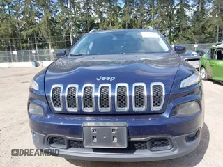 2015 Jeep Cherokee Latitude with VIN 1C4PJMCB0FW702535, listed as a IAAI auction lot 42149898 with 125,938 mi miles and . Bid and sale history available at carsss.com. Image 12.