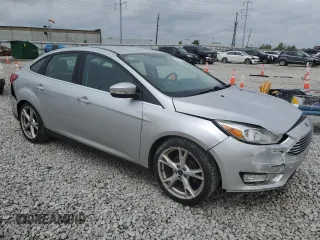 2016 Ford Focus Titanium with VIN 1FADP3J22GL354941, listed as a Copart auction lot 54401135 with 144,142 mi miles and Salvage title. Bid and sale history available at DreamBid. Image 4.
