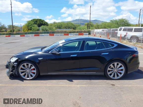 2013 Tesla Model S z VIN 5YJSA1CG0DFP17932, wystawiony jako IAAI lot #42212413 z przebiegiem 76 214 mil mil oraz . Historia ofert i sprzedaży dostępna na DreamBid. Obrazek 14.