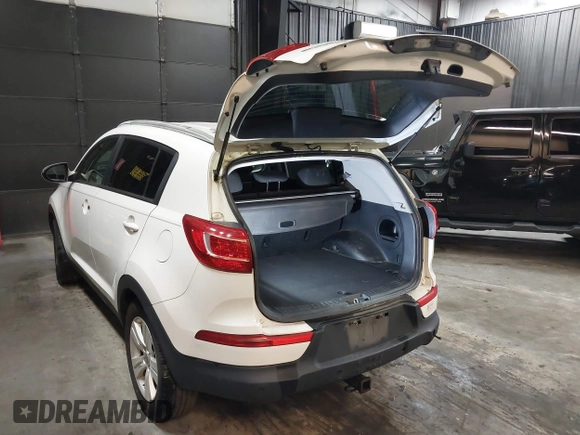 2012 Kia Sportage LX with VIN KNDPB3A26C7269092, listed as a IAAI auction lot 41892059 with 149,000 mi miles. Bid and sale history available at carsss.com. Image 3.