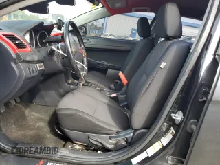 2009 Mitsubishi Lancer ES with VIN JA3AU26U49U002269, listed as a Copart auction lot 73992004 with 144,134 mi miles and Salvage Title. Bid and sale history available at DreamBid. Image 7.