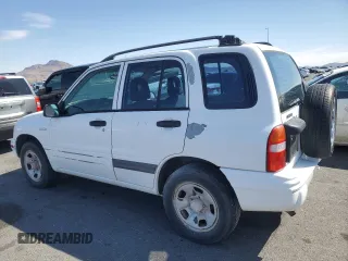 2003 Suzuki Vitara z VIN 2S3TE52V936103533, wystawiony jako Copart lot #55297135 z przebiegiem 122 230 mil mil oraz Szkody całkowita. Historia ofert i sprzedaży dostępna na DreamBid. Obrazek 2.