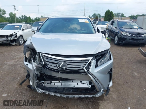 2017 Lexus RX 350 z VIN 2T2BZMCA9HC124727, wystawiony jako IAAI lot #42580173 z przebiegiem 106 749 mil mil oraz . Historia ofert i sprzedaży dostępna na DreamBid. Obrazek 13.