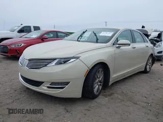 2014 Lincoln MKZ z VIN 3LN6L2GK4ER828656, wystawiony jako IAAI lot #41285297 z przebiegiem 102 513 mil mil oraz . Historia ofert i sprzedaży dostępna na DreamBid. Obrazek 2.