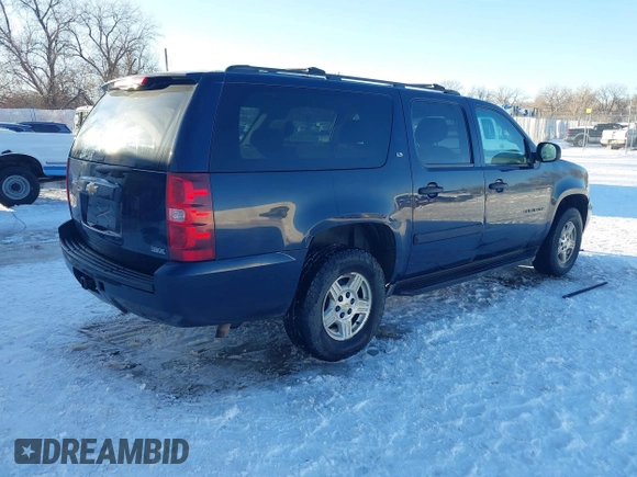 2008 Chevrolet Suburban Commercial with VIN 1GNFK16318J207263, listed as a IAAI auction lot 41246619 with 247,454 mi miles. Bid and sale history available at carsss.com. Image 4.