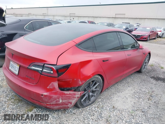 2022 Tesla Model 3 Long Range with VIN 5YJ3E1EB3NF273540, listed as a IAAI auction lot 41978069 with 27,247 mi miles and . Bid and sale history available at DreamBid. Image 4.
