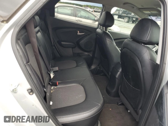 2013 Hyundai Tucson GLS with VIN KM8JU3AC1DU709937, listed as a Copart auction lot 52716295 with 181,711 mi miles and Salvage Title. Bid and sale history available at carsss.com. Image 11.