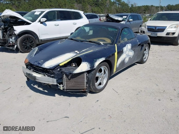 1999 Porsche Boxster with VIN WP0CA2983XU624800, listed as a IAAI auction lot 41897145 with 86,407 mi miles. Bid and sale history available at carsss.com. Image 2.