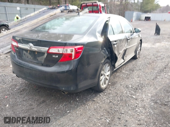 2014 Toyota Camry SE with VIN 4T1BK1FK6EU544726, listed as a IAAI auction lot 41630731 with 108,072 mi miles. Bid and sale history available at carsss.com. Image 4.