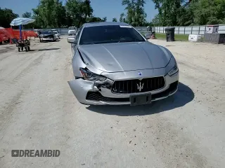 2015 Maserati Ghibli с VIN ZAM57XSA9F1154155, выставлен на аукционе Copart как лот 57093695 с пробегом 63 190 миль миль и Списание • Salvage title. История ставок и продаж доступна на DreamBid. Изображение 13.