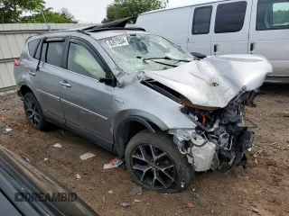 2018 Toyota RAV4 Hybrid SE with VIN JTMJJREV6JD238570, listed as a Copart auction lot 63972534 with Not provided miles and Salvage title. Bid and sale history available at DreamBid. Image 4.