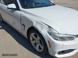2014 BMW 4 Series 428i xDrive with VIN WBA3N5C55EK196898, listed as a IAAI auction lot 42112580 with 184,381 mi miles. Bid and sale history available at carsss.com. Image 6.