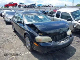 2002 Nissan Maxima GXE z VIN JN1DA31DX2T411198, wystawiony jako IAAI lot #42188090 z przebiegiem Nie podano mil oraz . Historia ofert i sprzedaży dostępna na DreamBid. Obrazek 1.