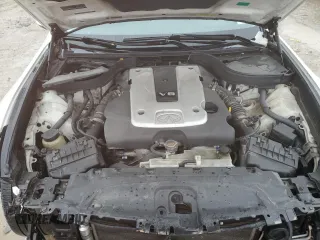 2011 Infiniti G25 x z VIN JN1DV6AR1BM650229, wystawiony jako Copart lot #47320395 z przebiegiem 167 404 mil mil oraz Szkoda całkowita • Salvage title. Historia ofert i sprzedaży dostępna na DreamBid. Obrazek 13.