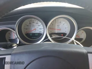 2005 Dodge Magnum RT z VIN 2D8GV582X5H549468, wystawiony jako Copart lot #77535504 z przebiegiem 200 963 mil mil oraz Szkoda całkowita • Salvage title. Historia ofert i sprzedaży dostępna na DreamBid. Obrazek 9.