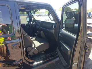 2023 Jeep Gladiator Freedom with VIN 1C6HJTAG1PL526229, listed as a IAAI auction lot 41972084 with 26,021 mi miles. Bid and sale history available at carsss.com. Image 5.