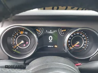 2020 Jeep Wrangler Unlimited Sport S with VIN 1C4HJXDN8LW269539, listed as a IAAI auction lot 42317928 with 63,924 mi miles and . Bid and sale history available at DreamBid. Image 7.