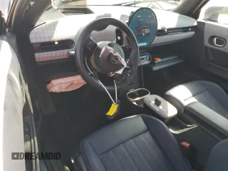 2025 MINI Hardtop Cooper S with VIN WMW23GD00S2W74060, listed as a Copart auction lot 52106175 with 410 mi miles and Salvage Title. Bid and sale history available at DreamBid. Image 8.