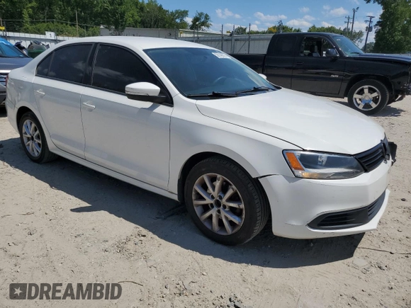 2011 Volkswagen Jetta SE with VIN 3VWDZ7AJ0BM052023, listed as a Copart auction lot 59148675 with 132,303 mi miles and Salvage title. Bid and sale history available at DreamBid. Image 4.