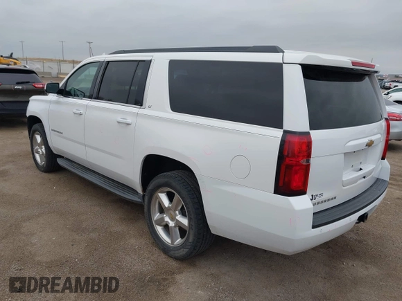 2015 Chevrolet Suburban LT with VIN 1GNSKJKC7FR547276, listed as a IAAI auction lot 42041289 with 189,075 mi miles and . Bid and sale history available at DreamBid. Image 3.