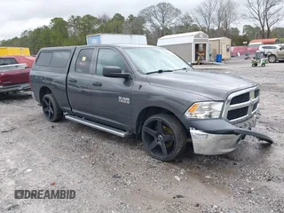 2015 Ram 1500 Tradesman with VIN 1C6RR6FG8FS661283, listed as a IAAI auction lot 41729124 with 126,986 mi miles and . Bid and sale history available at DreamBid. Image 1.