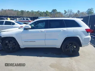 2015 Jeep Grand Cherokee Altitude with VIN 1C4RJEAG4FC815743, listed as a IAAI auction lot 41815095 with 106,867 mi miles. Bid and sale history available at carsss.com. Image 15.